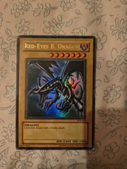 Yu-Gi-Oh! TCG Red-Eyes Black Dragon Holo Rare Card SDJ-001 MODERATELY PLAYED - Image 1