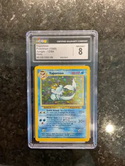 Pokemon Vaporeon Holo 1999 Jungle 12/64 Card CGC 8 NM/MINT # 12/64 - Image 1