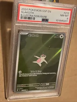 Pokemon TCG Slakoth 212/191 Sv08: Surging Sparks Holo PSA 8 NM Mint - Image 3