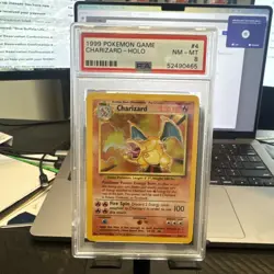 1999 POKEMON BASE SET UNLIMITED #4 CHARIZARD-HOLO PSA 8 - Image 1