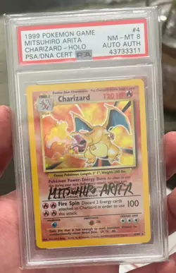 Pokemon PSA 8 Charizard Base Set Mitsuhiro Arita Signed Card (non personalized) - Image 1