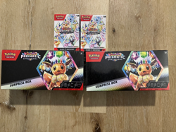 Pokemon Prismatic Evolutions Scarlet and Violet Surprise Box and Booster Bundle - Image 1