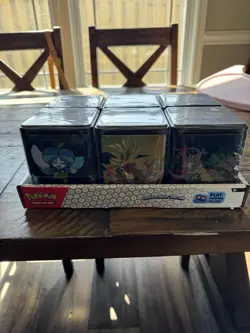 Pokemon TCG: Stacking Tins 2025 Factory Sealed 6 Tin Box With Store Display Case - Image 1