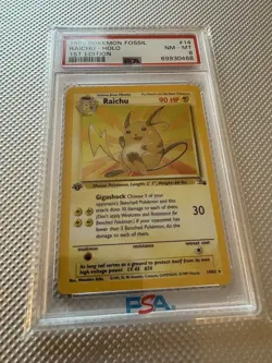 1999 Pokemon TCG Fossil Raichu Holo 1st Edition PSA 8 14/62 Card Stock - Image 1