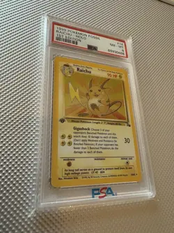 1999 Pokemon TCG Fossil Raichu Holo 1st Edition PSA 8 14/62 Card Stock - Image 3