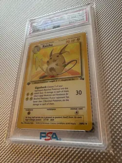 1999 Pokemon TCG Fossil Raichu Holo 1st Edition PSA 8 14/62 Card Stock - Image 4
