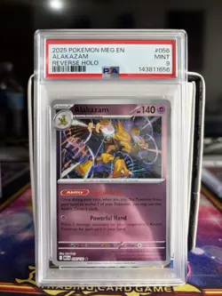 PSA 9 ALAKAZAM REVERSE HOLO 056/132 MEGA EVOLUTIONS POKEMON CARD - Image 1