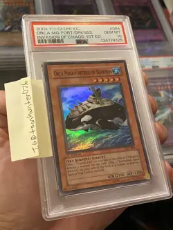 Yugioh 2004 Orca Mega-Fortress of Darkness IOC-084 1st Edition PSA 10 (POP 21) - Image 1