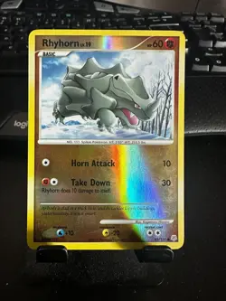 Pokemon TCG Rhyhorn 95/130 reverse holo card Diamond & Pearl - Image 1