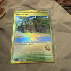 Pokemon 2023 Gold Hyper Rare Trainer Beach Court Trading Card - Image 1