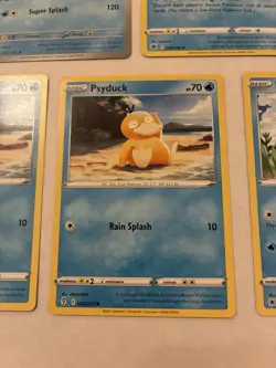 Lot Of 7 Psyduck and Golduck Pokemon Cards - Image 5