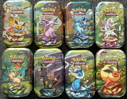 Pokemon Prismatic Evolutions Mini Tins (Complete Set of 8) - SEALED - Image 1