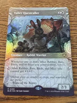 Valley Questcaller (Showcase) [Bloomburrow] FOIL R MTG MAGIC THE GATHERING NM - Image 1