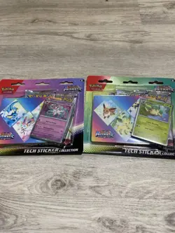 LOT OF 2 - Pokemon TCG SV Prismatic Evolutions Tech Sticker Collection Art Set - Image 1