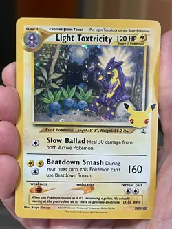 POKEMON LIGHT TOXTRICITY SWSH 137 PROMO BLACK STAR COSMOS HOLOFOIL NM CARD - Image 1