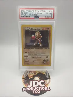 Pokemon Gym Heroes 1st Edition Rockets Hitmonchan Holo Card #11 PSA 8 - Image 1