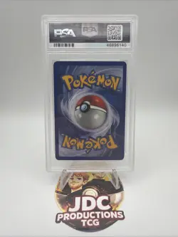 Pokemon Gym Heroes 1st Edition Rockets Hitmonchan Holo Card #11 PSA 8 - Image 2