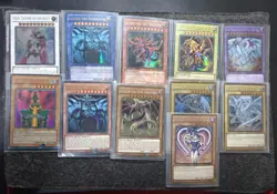 YuGiOh Holo Card Bundle – Odin, God Cards, Blue-Eyes, Dark Magician, & more - Image 1