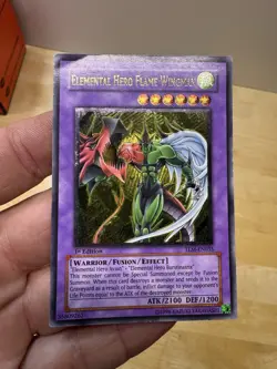 YU-GI-OH Elemental Hero Flame Wingman TLM-EN035 1st Edition Ultimate Rare - Image 1