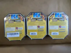 Pokemon Hidden Fates Tins - Charizard, Gyarados, and Raichu (Set Of 3) Sealed - Image 2