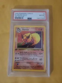 1999 Pokemon 1st Edition Jungle Flareon Holo 3/64 PSA 8 - Image 1