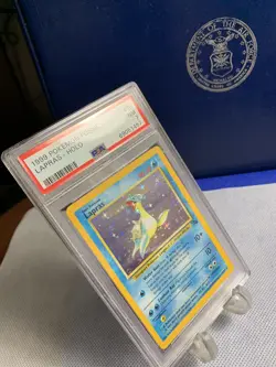 1999 Pokemon TCG Lapras Fossil 10 Holo Unlimited Holo Rare PSA NM 7 - Image 4