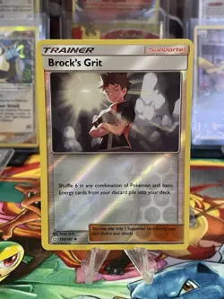 Pokemon - SM9 - Team Up - Brock's Grit 135/181 - Reverse Holo - Image 1