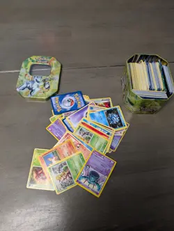 Unplayed Pokemon Card Lot With Tin, Unplayed And Unused - Image 1