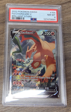 Charizard v 154/172 PSA 8 card - Pokemon - Mint / NM - Brilliant Stars - Image 1