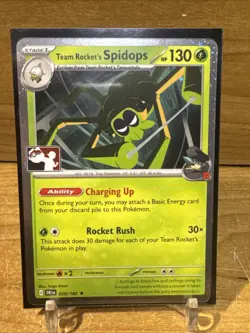 Team Rocket’s Spidops 020/182 DRI Prize Pack Play! Pokemon Holo Stamped NM - Image 1