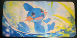 POKEMON TCG - MUDKIP - RUBBER PLAYMAT -60CM X 30CM PERFECT FOR TCG - Image 1