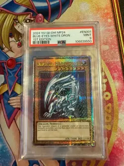 2024 YU-GI-OH! MP24-25TH ANV TIN: DUELING MIRRORS BLUE-EYES WHITE DRAGON PSA 9 - Image 1