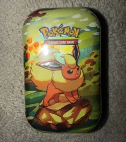 🌟NEW, SEALED! Pokemon TCG Prismatic Evolutions Mini Tin Flareon Art - Image 1