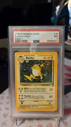 2000 Pokemon Base Set 2 Raichu Holo #16/130 PSA 7 - Image 1