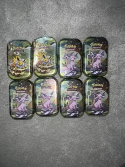 8x Pokemon TCG Prismatic Evolutions Mini Tins – Brand New & Factory Sealed - Image 1