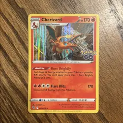 POKEMON CHARIZARD #010/078 RARE HOLOFOIL NM POKEMON GO CARD - Image 1