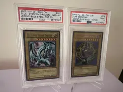 Yu-Gi-Oh! 1st Edition LOB - Blue-Eyes White Dragon PSA 8 & Dark Magician PSA 9 - Image 1