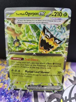 Teal Mask Ogerpon ex Pokemon Prismatic Evolutions 012/131 TCG - NM/Mint English - Image 1