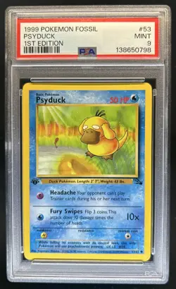 1999 Pokemon Fossil 1st Edition Psyduck #53/62 PSA 9 - Image 1