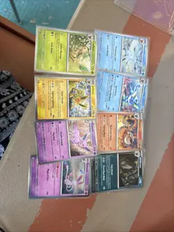 Pokemon Prismatic Evolutions Costco Cosmos Holo Eevee Evolution Set Of 8 - Image 1