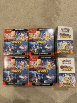 Pokemon Surging Sparks 4 Booster Bundle & 2 Half Booster Boxes - Image 1
