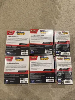 Pokemon Surging Sparks 4 Booster Bundle & 2 Half Booster Boxes - Image 2