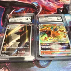 Pokemon TCG Sword & Shield Charizard VSTAR Japanese Graded Holo 2 Card Lot - Image 1