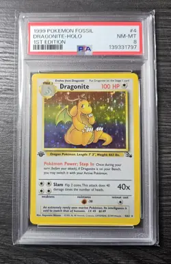 1999 Pokemon Fossil Dragonite Holo 1st Edition PSA 8 - Image 1