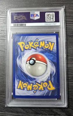 1999 Pokemon Fossil Dragonite Holo 1st Edition PSA 8 - Image 2