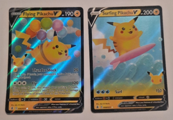 2021 POKEMON TCG CELEBRATIONS FLYING + SURFING PIKACHU V 06/25-08/25 - Image 1