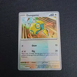 Pokemon Prismatic Evolutions Dunsparce Reverse Holo Card 079/131 Master Ball NM - Image 1