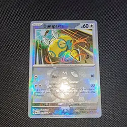 Pokemon Prismatic Evolutions Dunsparce Reverse Holo Card 079/131 Master Ball NM - Image 2