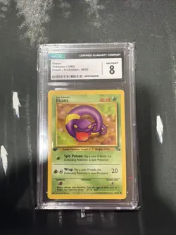 Ekans, 1999 Pokemon Fossil 1st Edition Card 46/62. CGC 8 NM/Mint - Image 1