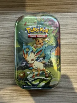 Pokemon TCG | Scarlet & Violet | Prismatic Evolutions Mini Tin – Leafeon - Image 1